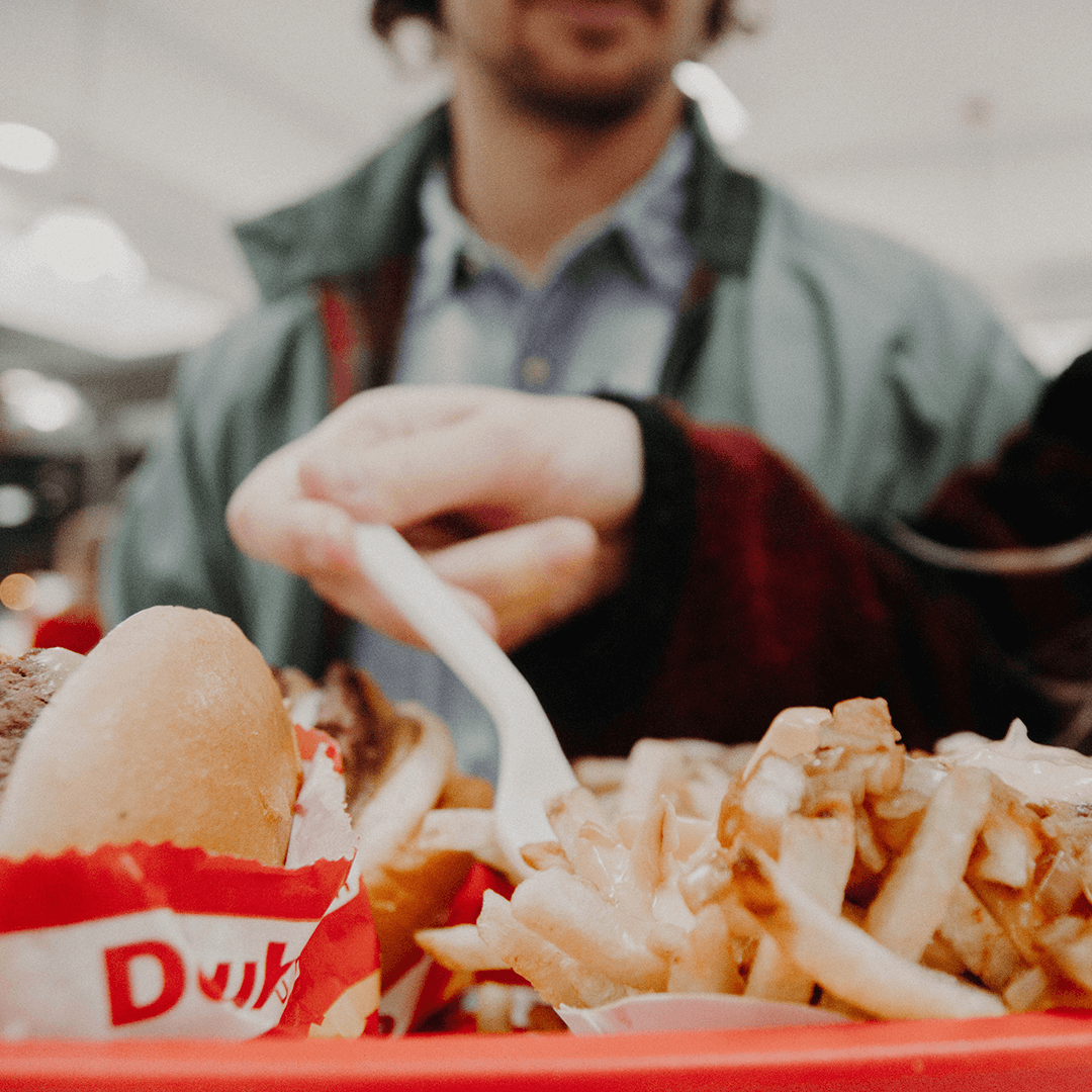 man eating fast food