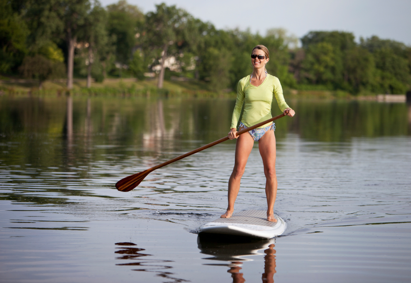 Woman paddle boarding