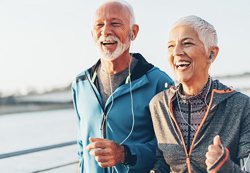 Couple running and smiling